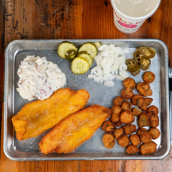 Blake's Barbecue fried catfish meal with potato salad, pickles, onions, jalapeños, and fried okra.
